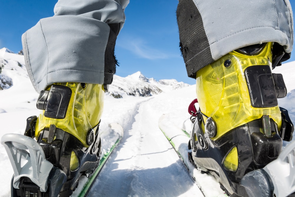 Close up of skier's boots and skies from unusual angle.jpg